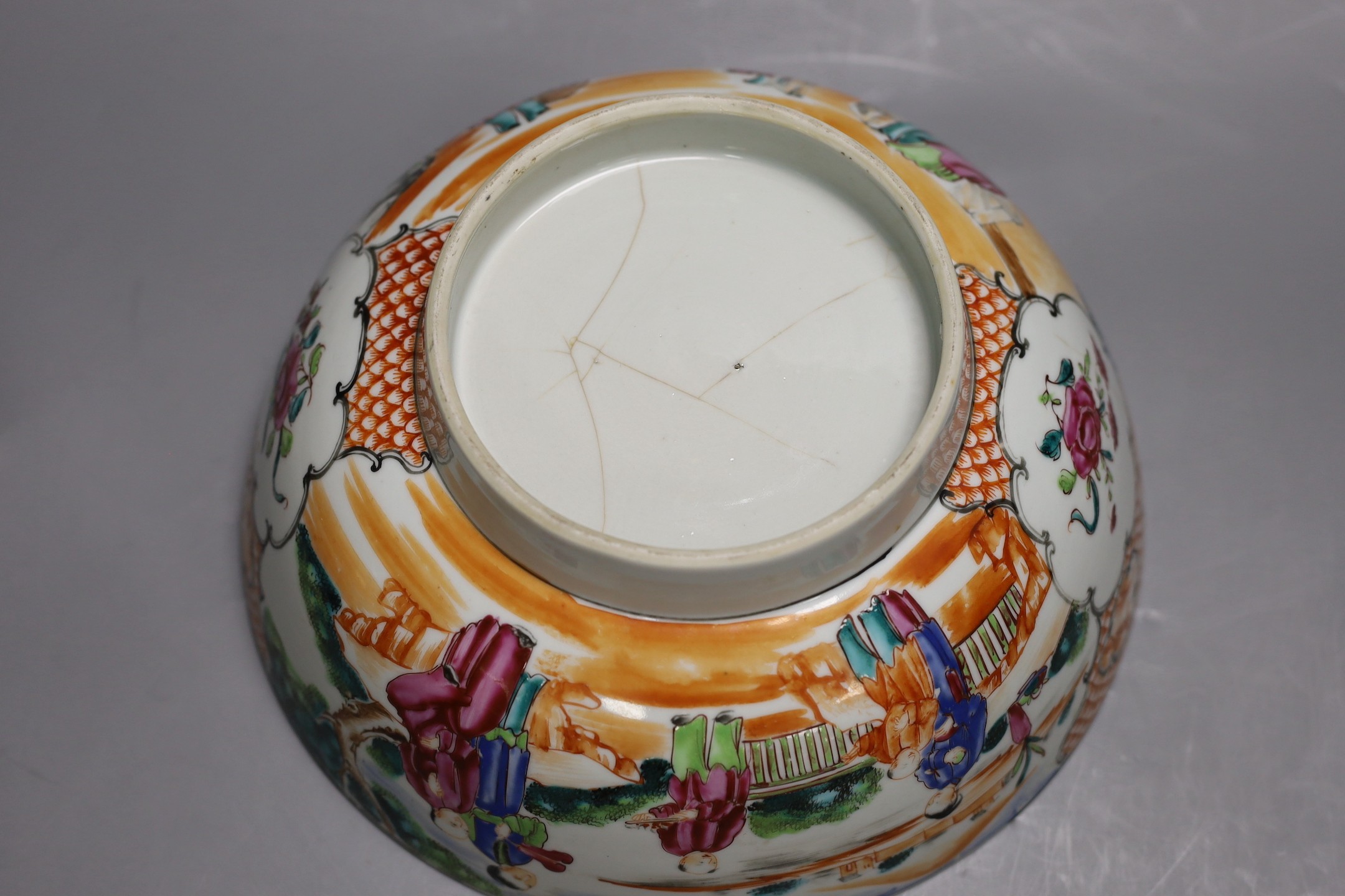 A Chinese Qianlong blue and white garlic neck vase and a famille rose bowl, 18th century, bowl diameter 26cm